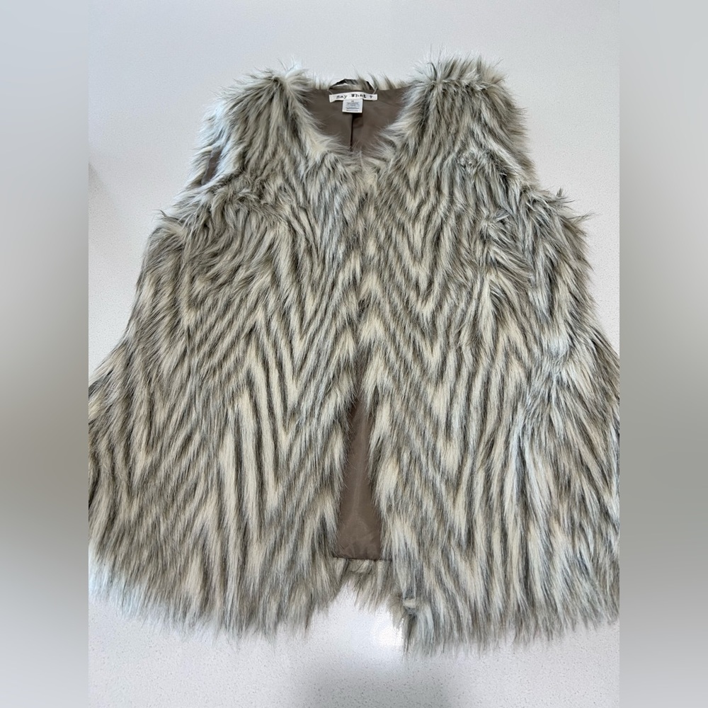Woman’s flax fur vest. Color is brown and cream, size medium